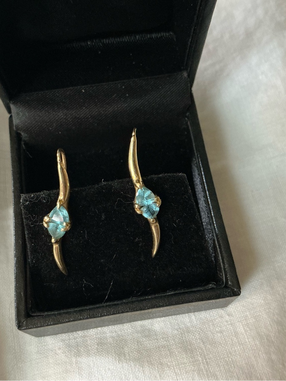 14kt yellow gold blue topaz ear pins (135-5)